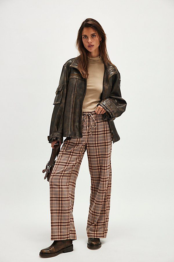 A perfectly plaid version of our Hudson Canyon Stripe Pants, this slouchy pair is featured in a high-rise fit and wide-leg style with a drawstring waistband. **Fit:** High-rise; wide, full-length legs **Features:** Soft cotton fabrication with wide plaid print throughout, adjustable drawstring waistband, pockets for hands, back-pocket detail **Why We ❤ It:** These billowy pants pair perfectly with your favorite tank and strappy sandals. | Hudson Canyon Pants by Free People in Tan, Size: XL Fall Season Wide Leg Trousers, Fall Utility Wide Leg Pants With Relaxed Fit, Casual Plaid Wide Leg Pants, Relaxed Fit Plaid Pants For Fall, Plaid Bottoms For Fall Loungewear, Plaid Wide Leg Bottoms For Fall, Plaid Loungewear Bottoms For Fall, Casual Plaid Wide Leg Pants For Fall, Plaid Wide-leg Pants For Fall