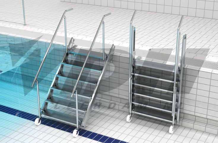 a set of stairs next to a swimming pool