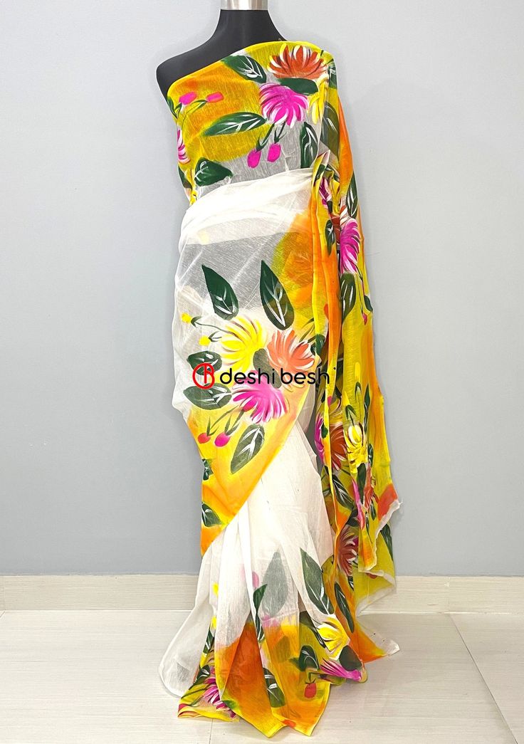 This Hand Painted Mixed Cotton Saree is perfect for your everyday and occasional use. Mixed Cotton Saree. All Over Floral Hand Painted Work. No Blouse Piece. Color: There might be slight color variation due to lighting and flashes while the photo shooting. The color may also vary because of different screen resolutions. Wash Care: Wash with cold water. Green Floral Print Saree For Summer, Summer Green Floral Print Saree, Multicolor Summer Saree With Unstitched Blouse, Summer Multicolor Saree With Unstitched Blouse, Multicolor Saree With Unstitched Blouse For Summer, Fitted Multicolor Summer Saree, Festive Multicolor Saree For Spring, Multicolor Fitted Saree For Spring, Yellow Saree With Pallu For Summer