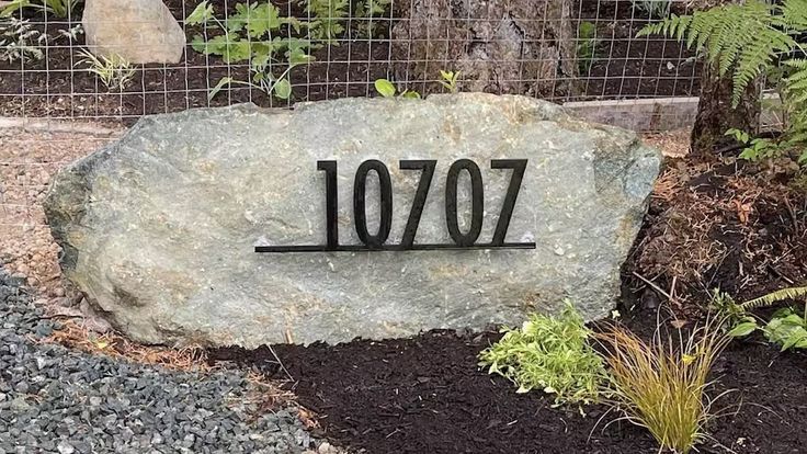 a large rock with the number 707 on it