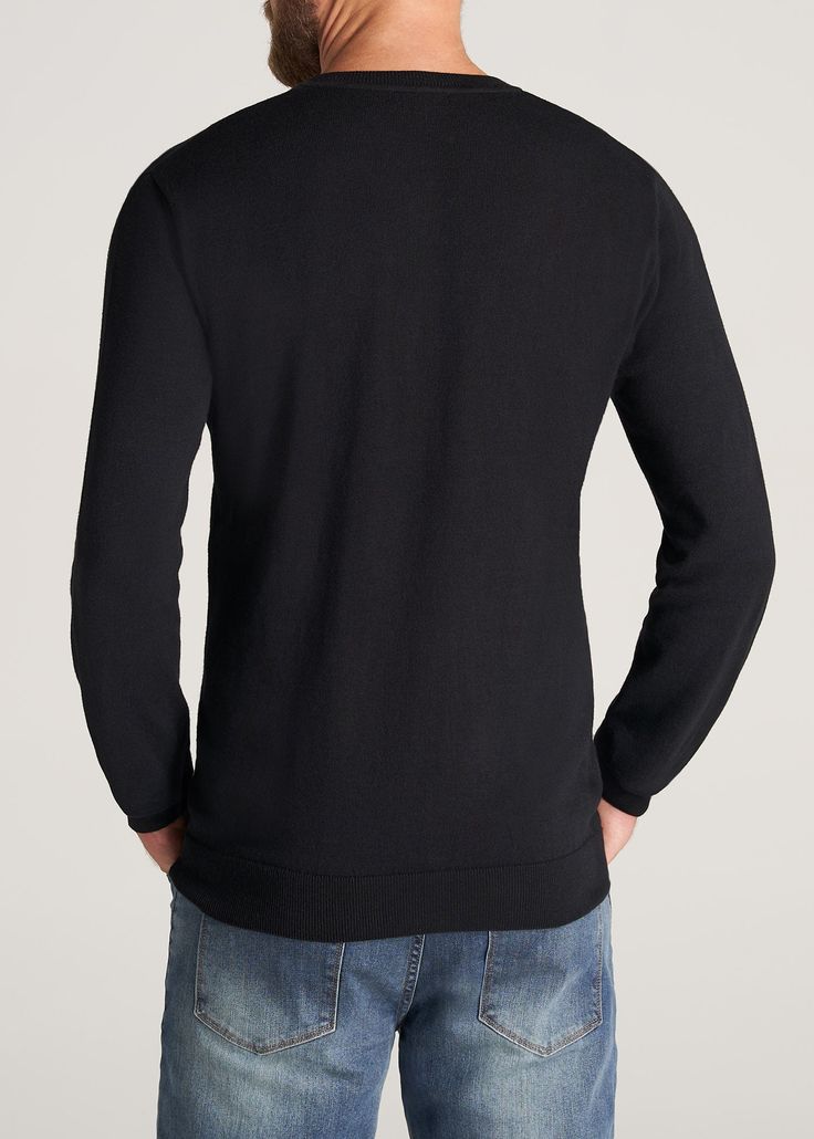 American Tall Men's Everyday V-Neck Sweater in Black. 60% Cotton, 40% Polyester. Refined, modern look. Long sleeve with ribbing at sleeve cuff. Ribbed shallow v-neck opening. More relaxed through the sleeves, chest, and waist for a traditional fit. Pre-washed to control shrinkage. Cut to your height and crafted to fit your build. Made for everyday, year-round comfort. MORE DETAILS:Designed to ensure that you stay warm, this Everyday V-Neck Sweater will never make you feel too warm. Who said you Tall Men, Extra Long Sleeves, Sleeve Cuff, Black American, Who Said, Tall Guys, Sweater Black, Polished Look, Men's Sweater