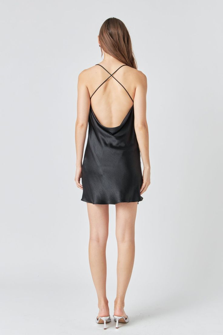 We're obsessing over this Cowl Neck Mini Dress with X-Back! With a stylish cowl neckline and an cross back design, this mini dress is perfect for any event. Unlined and mini length, this dress is sure to turn heads. Add some statement earrings and heels to complete the look. Cowl neckline X-back Unlined Mini length Hand wash cold Do not bleach Do not tumble dry Iron low Shell: 100% Polyester Lining: 100% Polyester TL352D Total length: 32", Bust: 35.50" XS BLACK: Height 5'9" / Bust 30.5" / Waist Sleek Tie-back Dress For Date Night, Sleek Tie Back Dress For Date Night, Chic Cowl Back Mini Dress, Sleek Tie-back Dress For Night Out, Sleek Tie Back Dress For Night Out, Chic Backless Dress With Ruched Cowl Back, Black Backless Cowl Back Dress For Night Out, Black Cowl Back Backless Dress For Night Out, Summer Evening Mini Dress With Cowl Neck