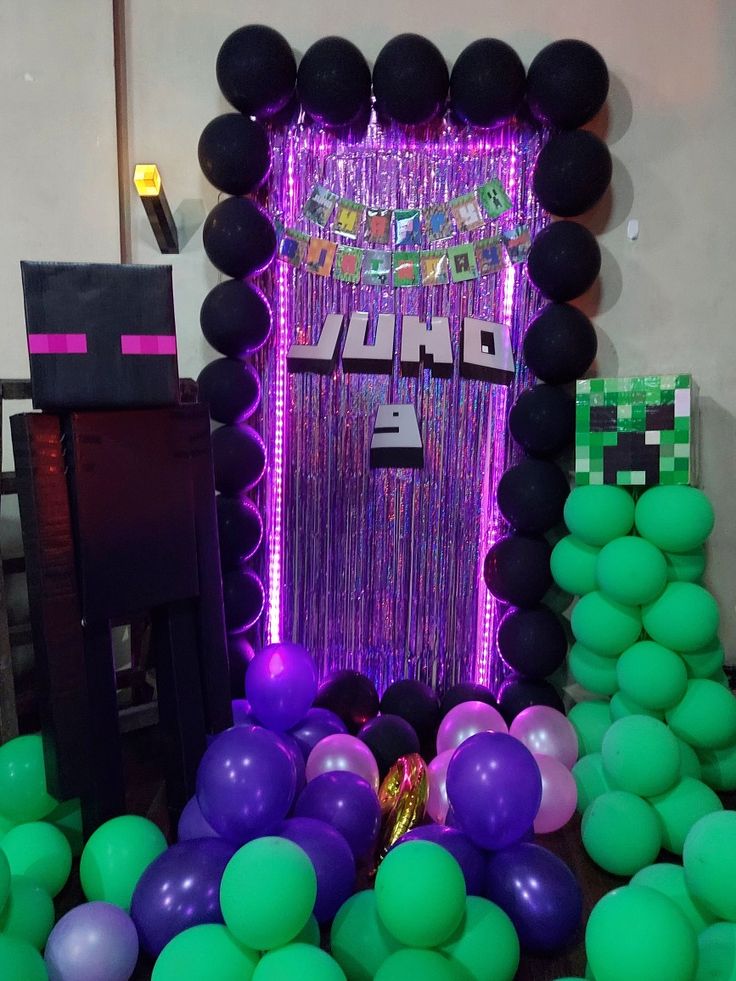 a party decoration with balloons and streamers