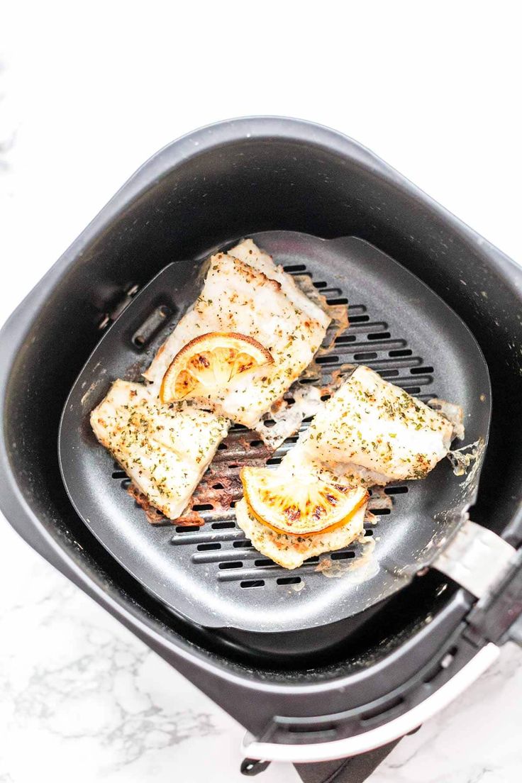 the food is being cooked in the air fryer