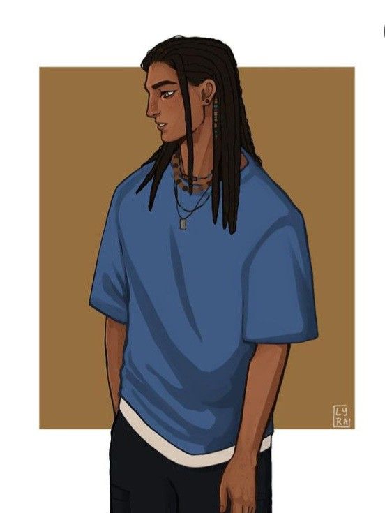 a man with dreadlocks wearing a blue shirt