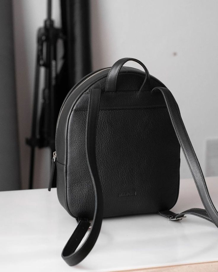 Our classic leather backpack is a timeless and stylish choice for everyday use. Made from premium quality leather, this backpack offers durability, comfort and a sleek look. The straps are comfortable and adjustable, and the leather adds a touch of elegance to any outfit. It's perfect for work, travel, and casual outings, as well as for students. With its classic design, it will be a reliable companion for years to come. It's available in a variety of colors to match your personal style and pref Classic Backpack With Adjustable Strap For On-the-go, Classic Everyday Backpack With Adjustable Strap, Classic Standard Backpack With Smooth Grain, Classic Leather Backpack For School With Soft Leather, Classic School Backpack In Soft Leather, On-the-go Smooth Grain Leather Backpack, Classic Leather Backpack With Smooth Grain For On-the-go, Everyday Leather Backpack With Smooth Grain, Classic Leather Backpack With Leather Lining For On-the-go