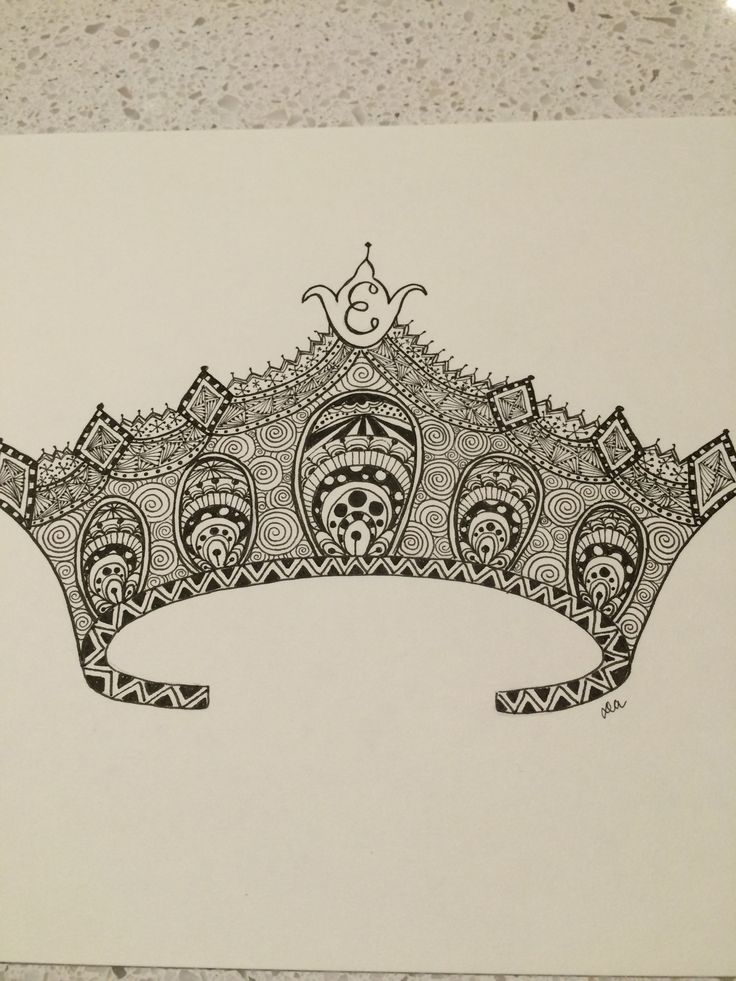 a black and white drawing of a tiara on a countertop in a bathroom