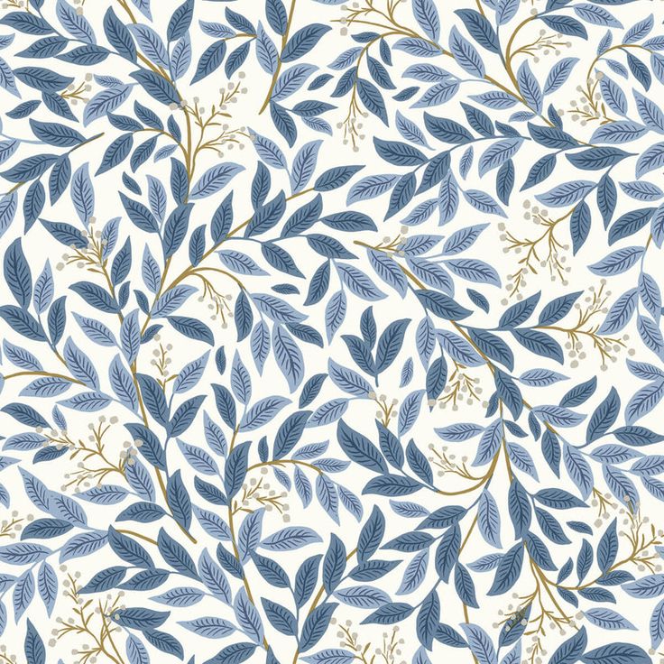 a blue and white wallpaper with leaves on it