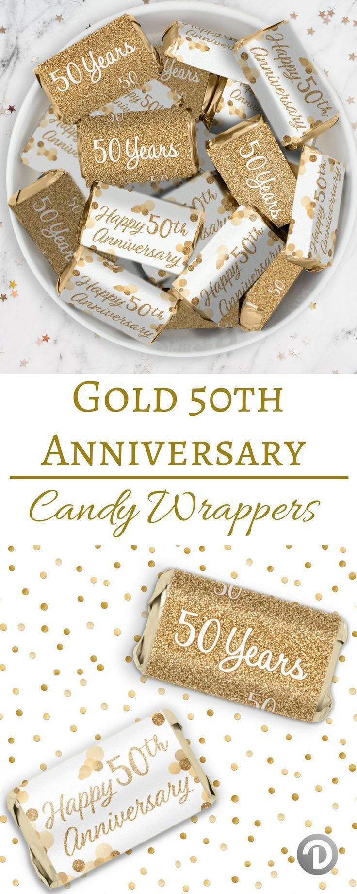 gold 50th anniversary candy wrappers on a plate