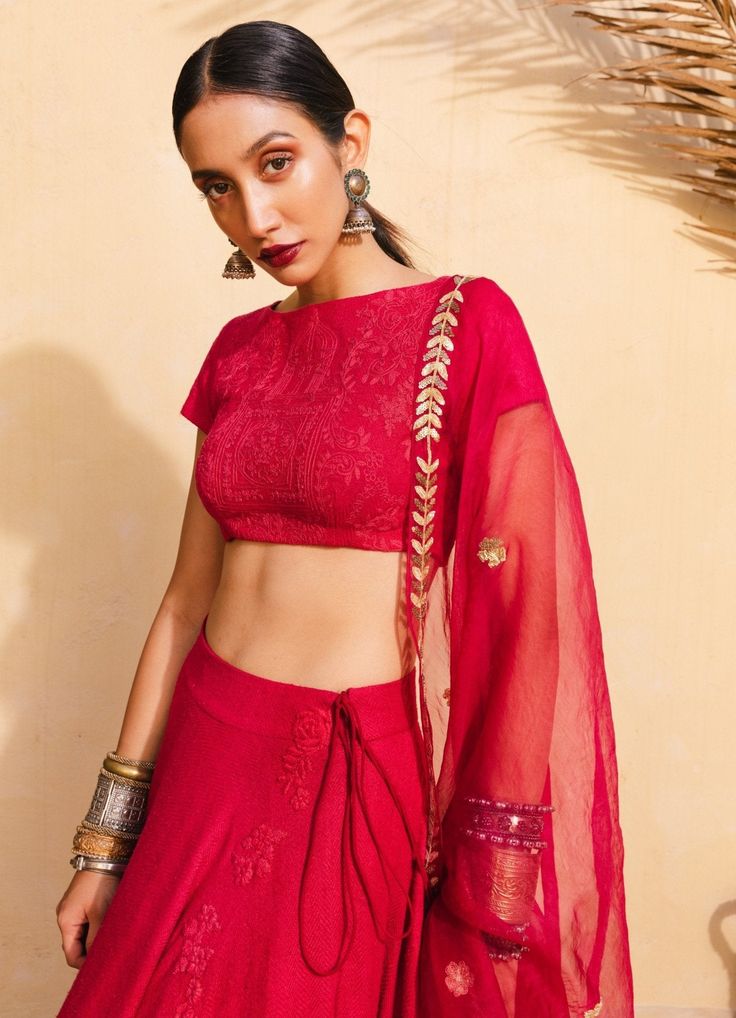 A red bohemian bridal lehenga with a silk blouse embroidered with moroccan detail with a handwoven silk circle lehenga, a red hand woven organza dupatta embroidered in tribal moroccan motifs in hammered gold All our blouses can be customised for sleeves, neck design and length. An additional Net Dupatta can be added from our Dupatta Collection Composition: Silk , Organza All products can be customised for sleeves, length of blouse and neck design Delivery : 4-6 weeks as the product is hand crafted. Check Size Guide or choose MySize for free customisation (All Sizes above XL can be made at 15% additional cost) For more information and sizes please contact fabiliciousfashion@gmail.com or visit our Copenhagen Studio About the Designer : The Little Black Bow collection is an absolute delight f Moroccan Motifs, Gold Lehenga, Bridal Lehenga Red, Bohemian Bridal, Red Lehenga, Indian Wedding Wear, Bohemian Bride, Dress Indian Style, Organza Dupatta