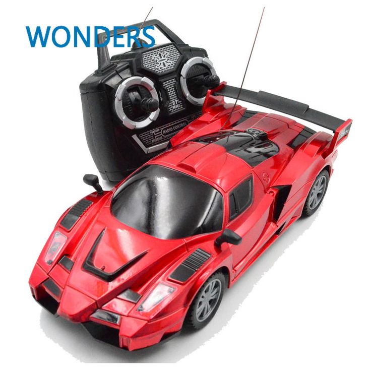 a red toy car with radio in it