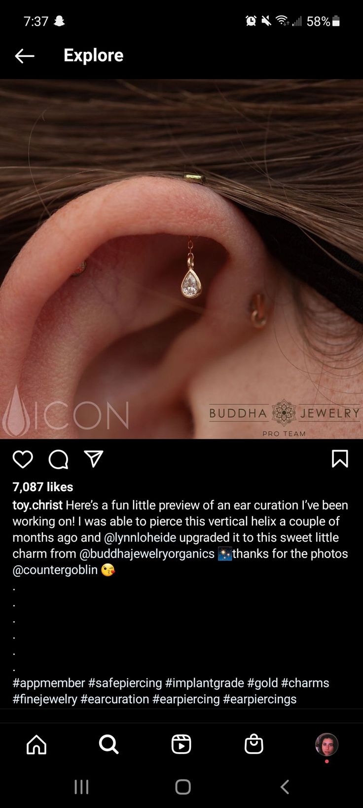 an image of a person with ear piercings on their ears and behind the ear