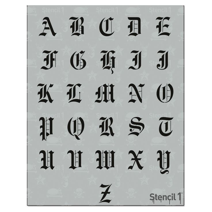 an old english alphabet with the letters and numbers in black ink on a gray background