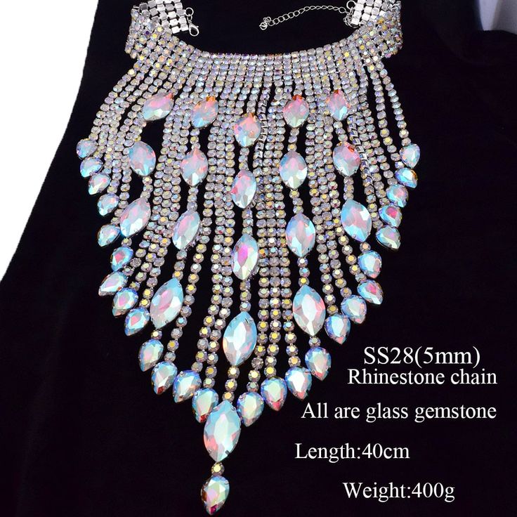 Level up your festival vibes with our Dazzling Crystal long irregular Tassel Necklace for Women. This stunning choker jewelry, bedecked with Shiny Glass Rhinestones, shimmers with a kaleidoscope of colors as you groove the night away. Crafted for both durability and flexibility, it's the ideal accessory to amp up your festival, concert, or special event style. Don't miss out on this mesmerizing festival must-have – grab yours today and dive into the festival magic! Festival Concert, Choker Jewelry, Womens Chokers, Wedding Accessory, Party Necklace, Rhinestone Choker, Festival Vibes, Dress Belt, Glamorous Wedding