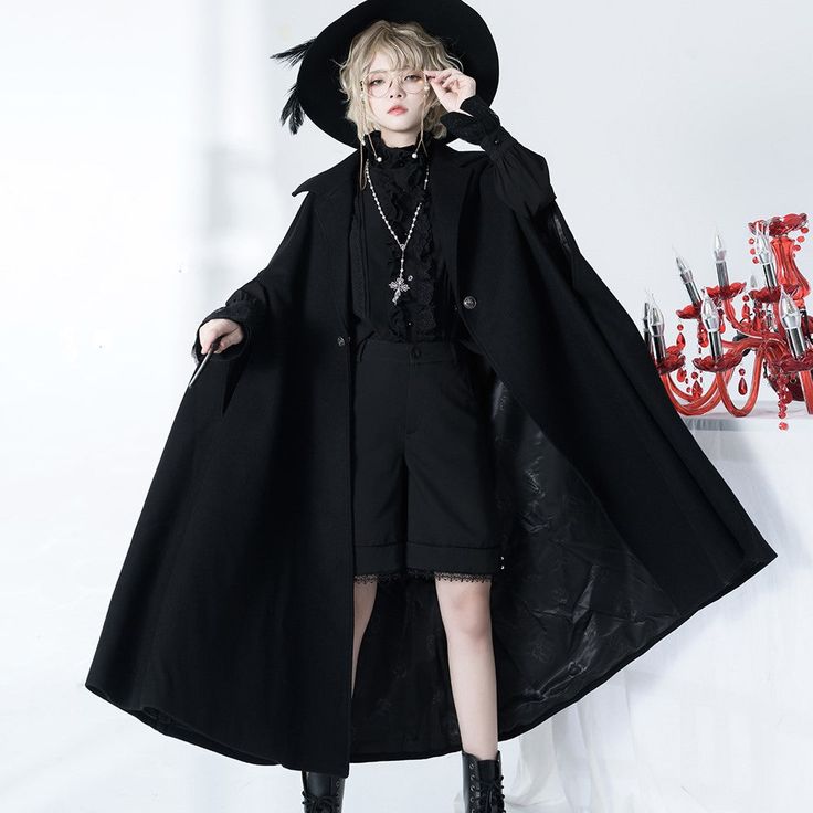 A long cloak for a prestigious black knight. Pair it with blouse and pants to create a boyish black knight outfit. Just put on a cloak to create a full atmosphere. Why not be invited into the world of knightly tales? 
 
 
 ＜Size＞ 
 
 S size 
 
 Length: 120cm 
 
 M size 
 
 Length: 124cm 
 
 L size 
 
 Length: 128cm 
 
 
 
 
 
 
 
 
 ＜Material＞ 
 
 Wool 
 Polyester 
 
 
 ＜Model worn＞ 
 
 Wearing size 
 
 S size 
 
 Model dimensions 
 
 Height: 160cm Gothic Cape Outerwear For Costume Party, Gothic Cape For Costume Party In Fall, Gothic Costumes For Fantasy Events In Fall, Vampire Style Cape For Costume Party In Winter, Vampire Cape For Winter Costume Party, Vampire Cape For Costume Party In Winter, Vampire Style Cape For Costume Party And Winter, Gothic Black Cosplay Costume For Alternative Fashion, Black Gothic Cosplay Costume For Alternative Fashion