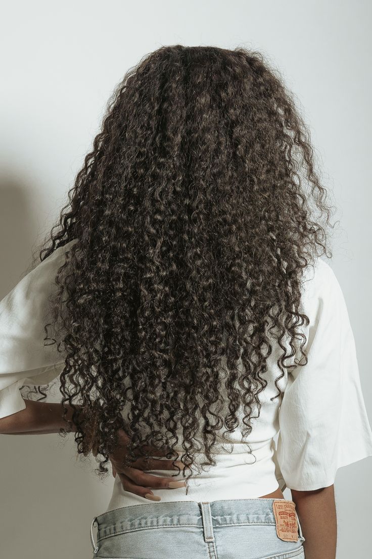 The carefree, effortless, naturally curly hair extensions you can run your fingers through, our ‘So Curly’ texture is our take on the 3a-3b curl pattern hair type. Warm-weather-approved and hailed as a vacation staple, our So Curly extensions will make the perfect addition to your hair-drobe if you're looking for extensions that can be heat styled, pressed bone straight, & even dyed while maintaining its luster & curl pattern. But, of course, keep heat styling to a minimum to preserve your curls Long Layered Curly Hair, Mixed Girl Hairstyles, Really Curly Hair, Kanekalon Hair, Curly Extensions, Pattern Hair, Kanekalon Hairstyles, Naturally Curly Hair, Heat Styling