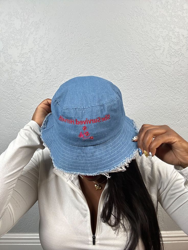 Ready for your next streetwear staple? This denim bucket hat with a distressed brim is a real statement piece—with the comfort of 100% cotton to boot. It’s an on-trend style that’ll be sure to get you a ton of compliments. • 100% cotton • Denim look • Classic brim with distressed look • 4 sewn eyelets on the sides of the hat • 2-panel designSize guide A (inches) B (inches) C (inches) One size 22 3 ⅛ 1 ¾ Medium Wash Cotton Bucket Hat With Wide Brim, Medium Wash Cotton Bucket Hat With Short Brim, Cotton Bucket Hat With Letter Print And Short Brim, Cotton Bucket Hat With Short Brim In Medium Wash, Medium Wash Cotton Bucket Hat, Trendy Summer Streetwear Bucket Hat, Casual Denim Bucket Hat With Short Brim, Casual Denim Blue Bucket Hat With Short Brim, Casual Bucket Hat With Curved Brim In Medium Wash