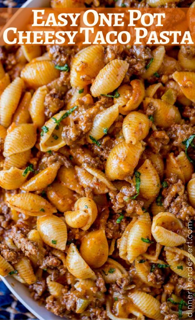 easy one pot cheesy taco pasta in a bowl with the title above it