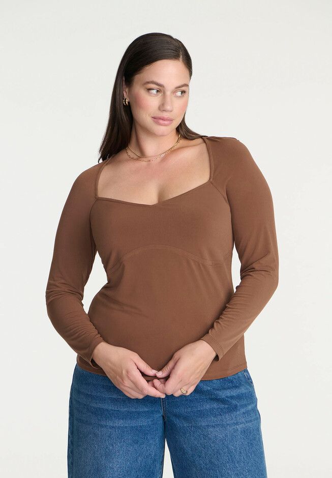 95% Polyester 5% SpandexClose fitPull On, Sweetheart necklineRaglan sleeve, Long fitted sleeveHits below the hip28" from highest point of shoulder on size Seamless Long Sleeve Fitted Top, Fall Square Neck Fitted Top, Fitted Long Sleeve Elastane Tops, Fitted Square Neck Top, Stretch Square Neck Tops In Elastane, Stretch Seamless Tops With Square Neck, Stretch Square Neck Seamless Tops, Seamless Stretch Tops With Square Neck, Square Neck Seamless Stretch Tops