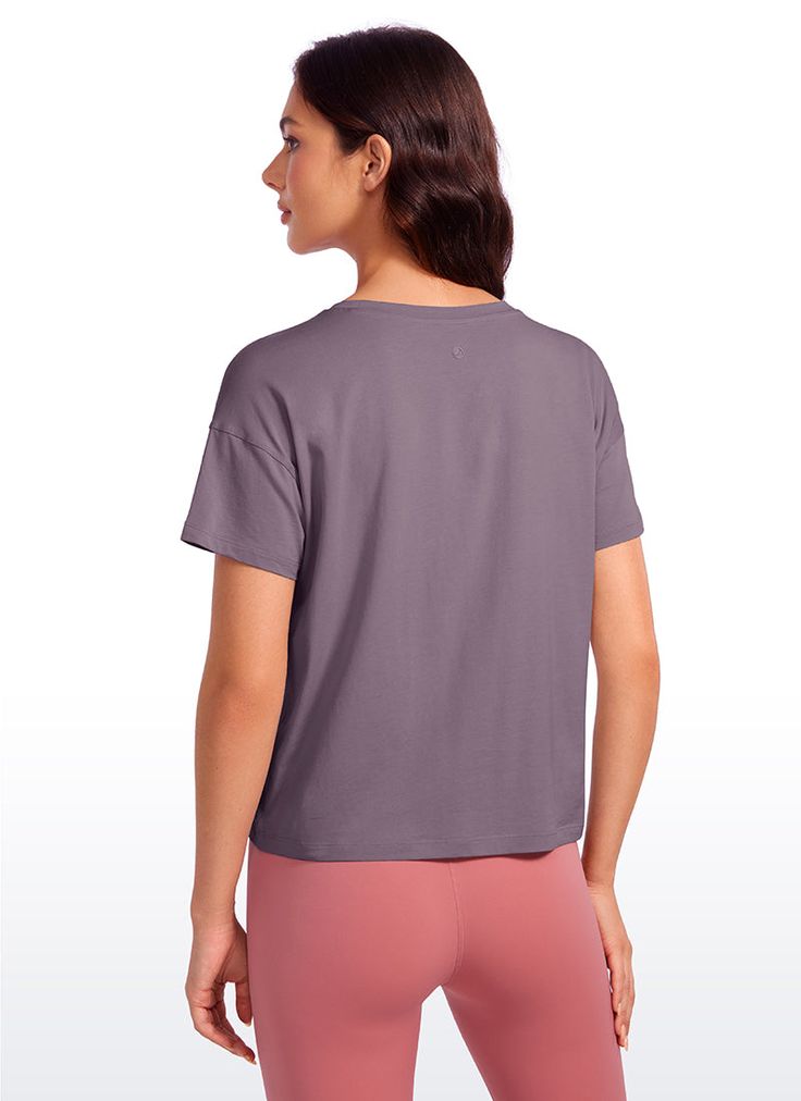 Pima Cotton collection is super soft and feels great against your skin, aiming to offer a comfortable feeling to you. Athletic short sleeve crop tops designed with a round neckline and flowy style for a simple and stylish look. Loose fit design allows you to move freely without restriction during exercise. Ideal for yoga, workout, and casual wear. Feature & Fitting: 
 Pima Cotton collection 
 Design for low-impact workouts or daily wear 
 Relaxed fit for moving freely 
 Round neck, hip lengt Boxy Short Sleeve Basic Cropped T-shirt, Boxy Athleisure Cropped T-shirt With Short Sleeves, Versatile Short Sleeve Activewear In Relaxed Fit, Solid Color Cropped T-shirt Athleisure, Versatile Relaxed Fit Short Sleeve Activewear, Casual Solid Color Short Sleeve Crop Top, Boxy Basic Cropped T-shirt With Short Sleeves, Athleisure Solid Color Cropped T-shirt, Solid Color Relaxed Fit Crop Top T-shirt