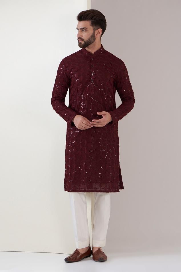 Maroon kurta with sequin embellished floral thread embroidered patterns. Comes with pant.
Components: 2
Pattern: Embroidered
Type Of Work: Thread,Sequin
Neckline: Mandarin Collar
Sleeve Type: Full
Fabric: Georgette
Color: Maroon
Other Details: 
Straight silhouette
Closure: Kurta: Front placket
Occasion: Sangeet,Mehendi and Puja - Aza Fashions Embroidered Patterns, Kurta Men, Kurta With Pants, Fashion App, Mandarin Collar, Aza Fashion, Mens Pants, Types Of Sleeves, Custom Made