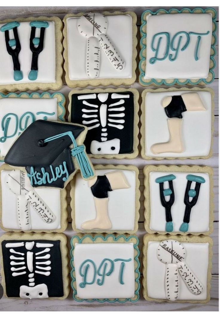 decorated cookies in the shape of graduation decorations