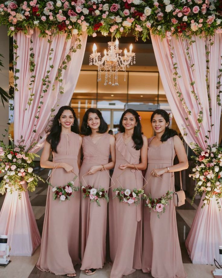 the bridesmaids are all wearing pink dresses