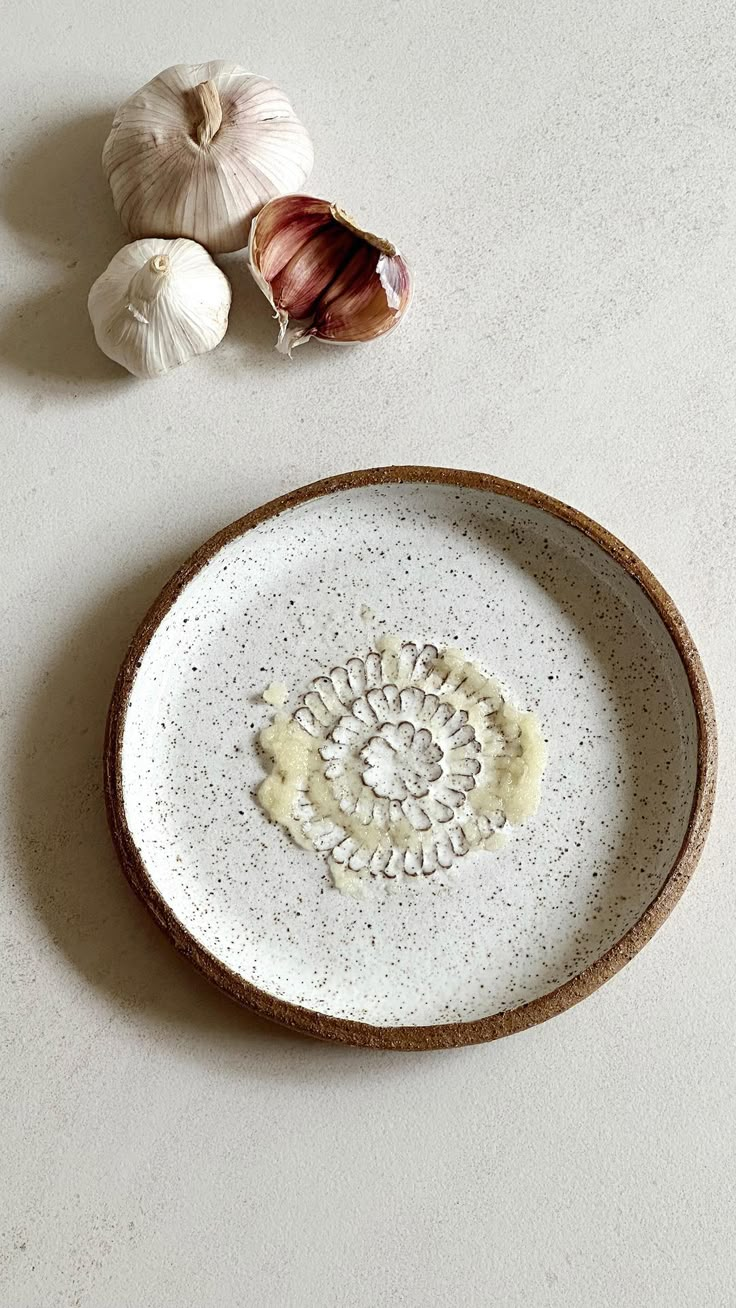 an image of a plate with garlic on it