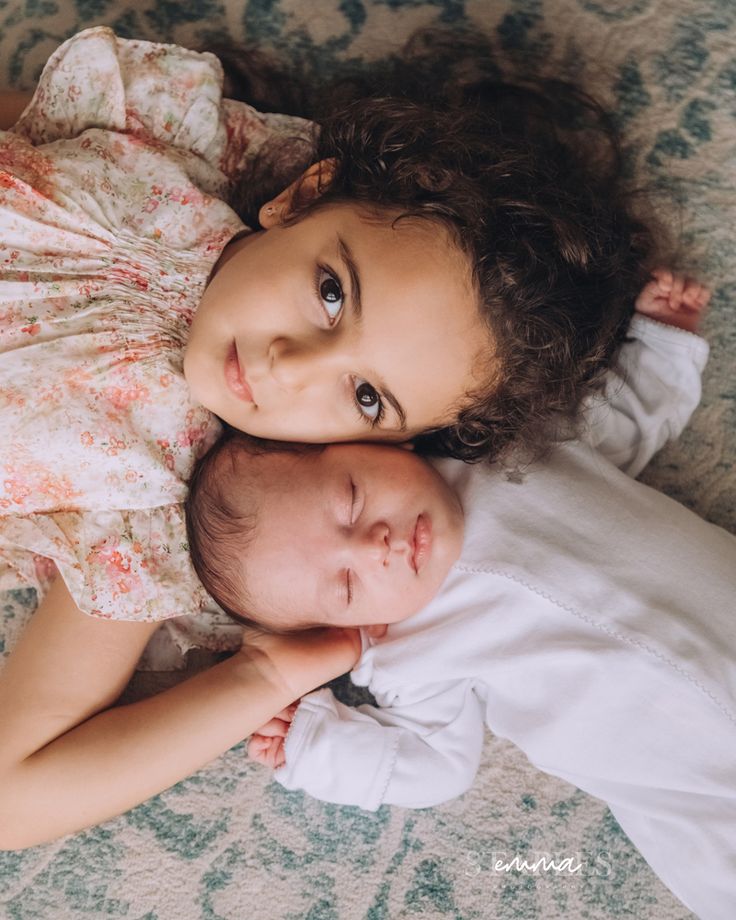 Big sister and newborn baby brother lye on the carpet looking up at the camera for a photoshoot at home  #dubainewbornphotoshoot #dubainewbornphotographer #emmastaplesphotography Newborn And Sister Photoshoot, Newborn Brother And Big Sister, Newborn And Sibling Photo Ideas Outdoor, Big Sister With Newborn, Newborn And Big Sister Photography, Big Sister Newborn Brother Pictures, Newborn Family Photos Older Sibling, 2 Under 2 Pictures, Newborn With Brother Photography