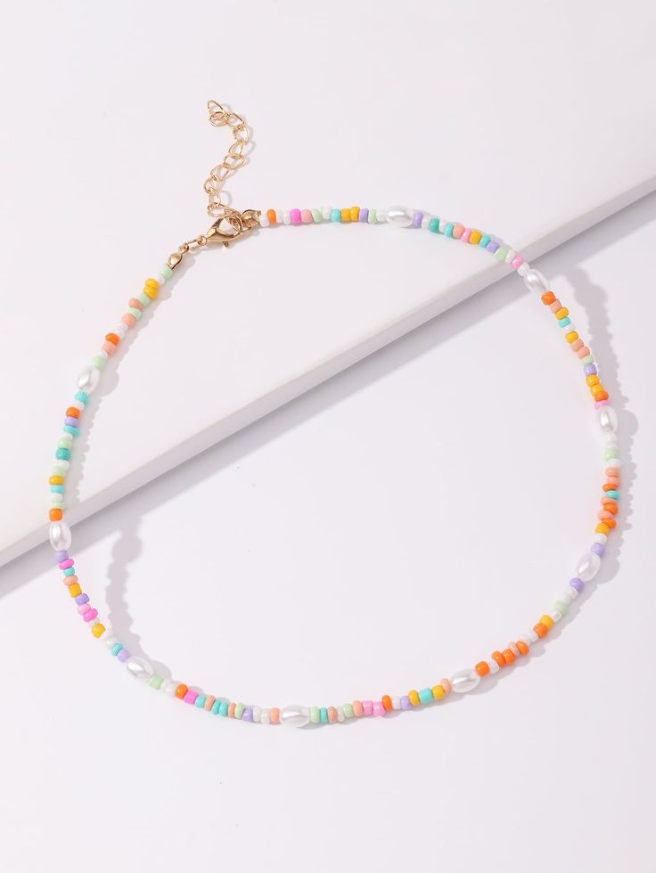 Color: Multicolor Gender: Women Material: Glass Quantity: 1 piece Style: Vacation Details: Beaded, Pearls Type: Beaded IN Length 15.7-17.6 This data was obtained from manually measuring the product, it may be off by 1-2 CM. Cheap Trendy Colorful Necklaces, Cheap Trendy Pearl Beaded Necklaces, Trendy Cheap Pearl Necklace With Colorful Beads, Fun Cheap Beaded Necklaces For Gifts, Cheap Fun Beaded Necklaces For Birthdays, Affordable Fun Beaded Necklaces For Birthdays, Affordable Summer Jewelry With Heart Beads, Cheap Colorful Beaded Pearl Necklaces, Affordable Trendy Beaded Necklaces For Birthdays