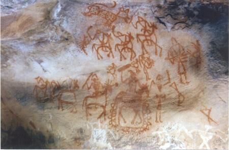 an image of cave paintings on the side of a mountain