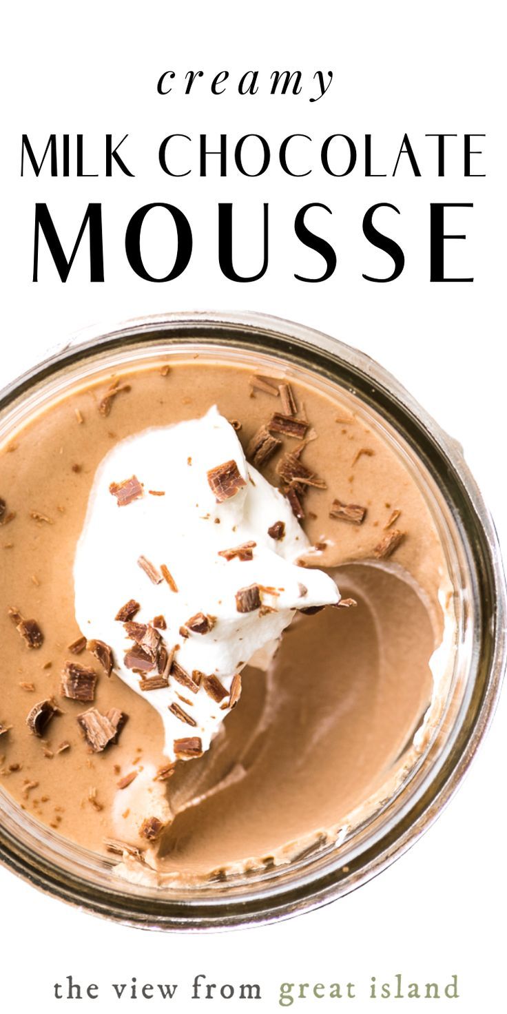 the cover of cream's milk chocolate mousse, with a spoon in it