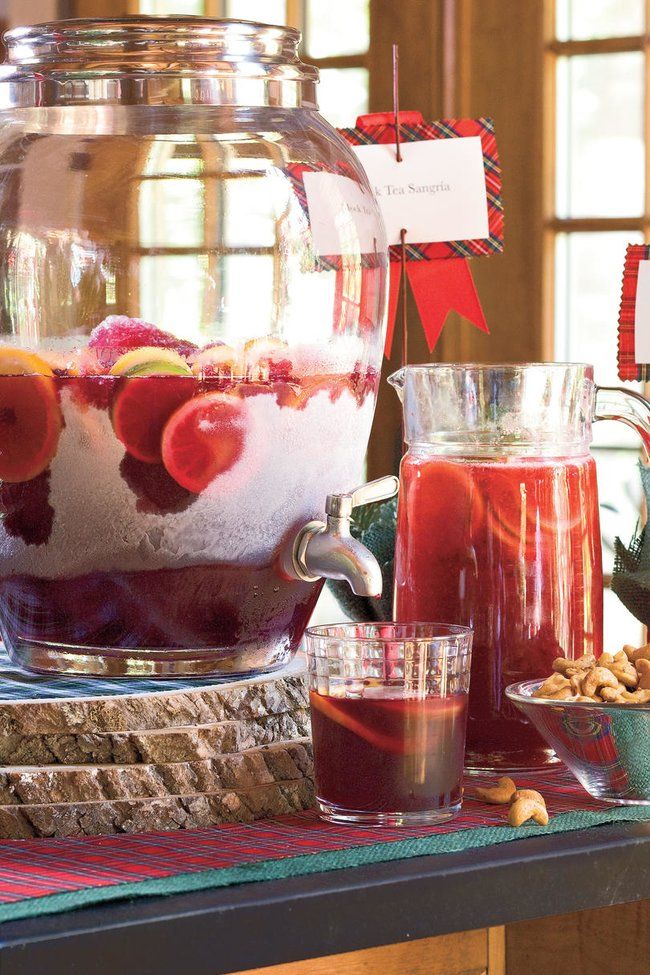 a table topped with lots of different types of food and drinks on top of it