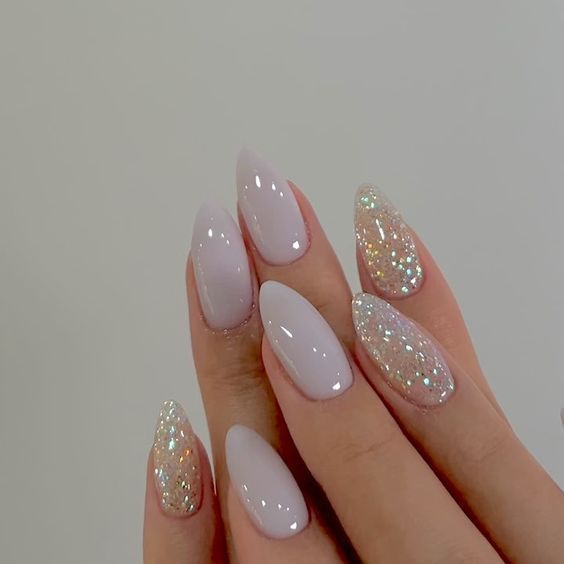 Simple Elegant Oval Nails, Gelx Short Oval, New Years Nails Sparkly Almond, Mani Nail Design, Neutral Nails Glitter Accent, Fall Wedding Nails Almond Shape, Bridal Jelly Nails, Matte Sparkle Nails Glitter, Black Glitter Nails Almond Shape