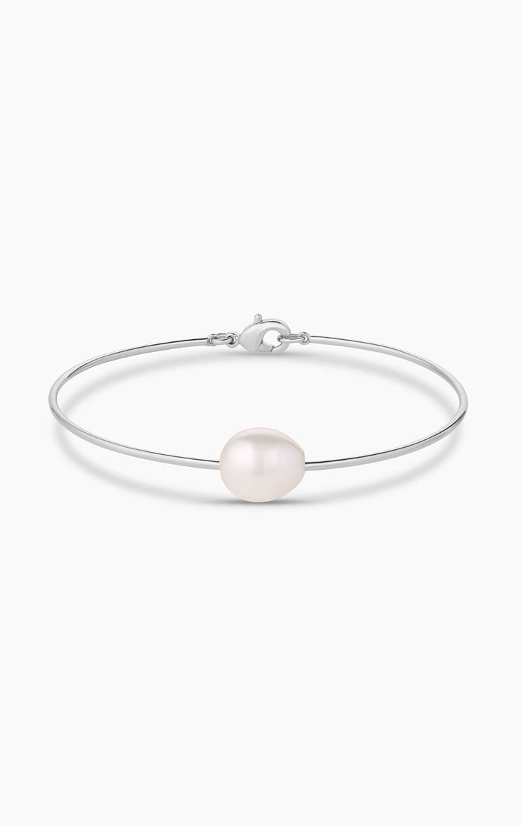 14k gold or rhodium plated freshwater pearl bangle bracelet with lobster clap closure. product note : freshwater pearls vary in texture, shape and size. These subtle differences make each pearl bracelet unique. Pearl Bangle Bracelet, Pearl Bangle, Pearl Bracelet, Bangle Bracelet, Rhodium Plated, Freshwater Pearls, Sale Items, My Jewellery, Bangle Bracelets