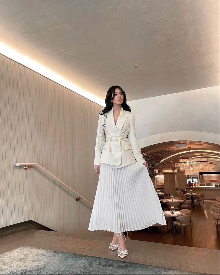 Blazer, pleated maxi skirt, classy style, elegant outfit, cream outfit, outfit idea, kdrama style, pearl heels, bow shoes Simple Old Money Outfit Women, Outfits Con Blazer Elegante, Blazer Elegant Outfits, Blazer And Skirt Outfits Hijab, Suits With Skirts For Women, White Ootd Classy, Dress Suits For Women Classy, Elegant Outfit Hijab, Ootd Classy Elegant