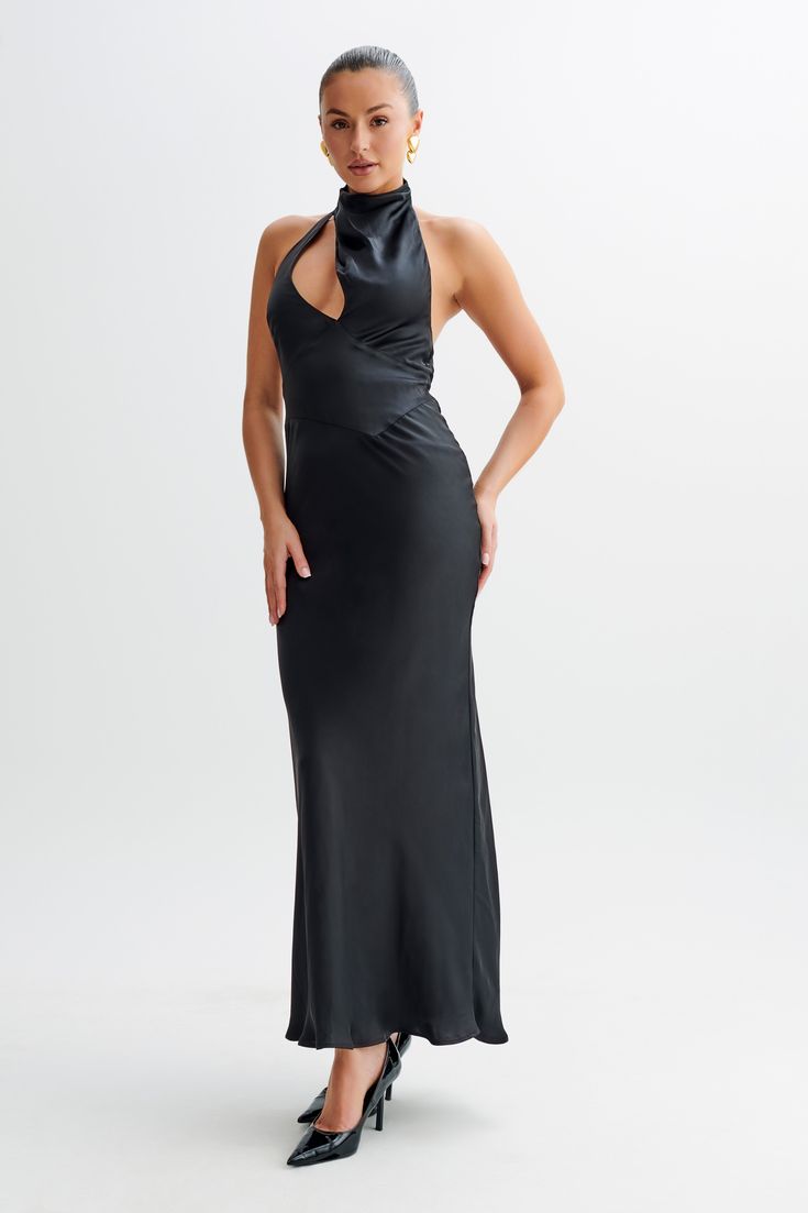 Unmatched beauty.The BELLADONNA Satin Halter Maxi Dress is an exquisite choice for elegant evenings and special occasions. This dress features a chic halter neckline with a front bust cutout that adds a touch of allure. The straight skirt flows gracefully to the floor, complementing the open back design for a striking silhouette. Fully lined for comfort, the dress also includes a centre back invisible zip for a seamless finish. With its sophisticated style and luxurious satin fabric, the Bellado Fitted Halter Neck Dress For Gala, Formal Sleeveless Evening Dress With Keyhole Back, Chic Halter Dress With Fitted Bodice For Parties, Keyhole Back Evening Dress For Prom Season, Evening Dress With Keyhole Back For Prom, Evening Dresses With Keyhole Back For Prom, Elegant Backless Dress For Gala Evening, Elegant High Neck Dress For Night Out, Formal Halter Neck Evening Dress