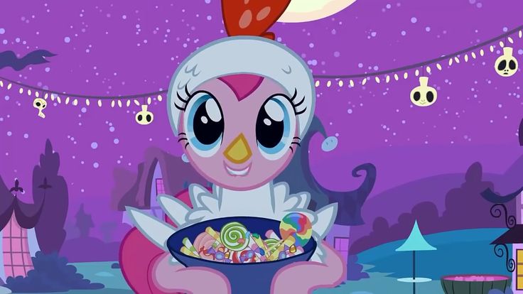 a cartoon character holding a bowl of candy in front of a purple sky with stars