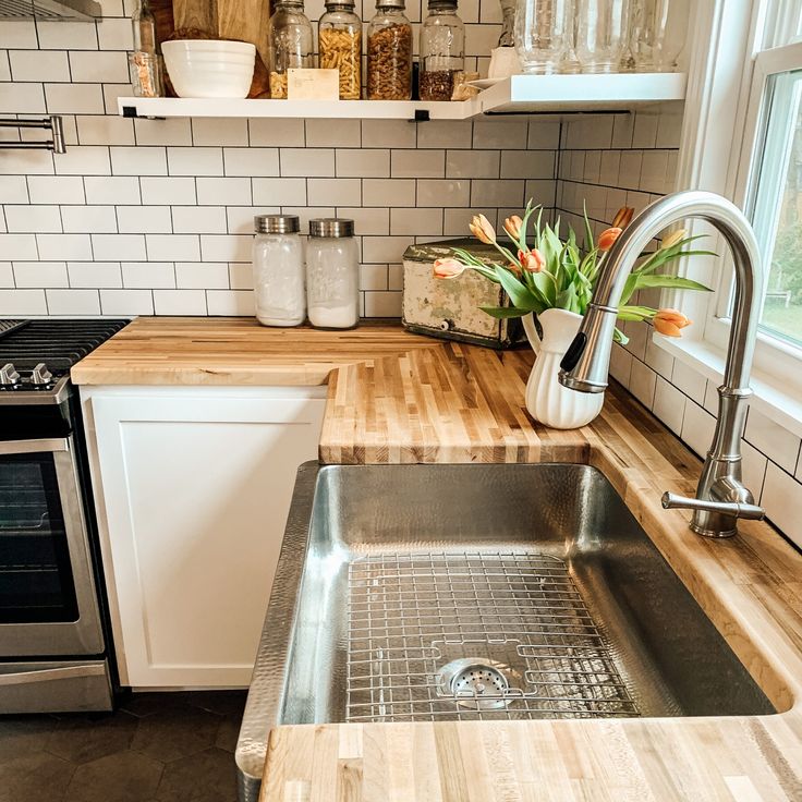 the kitchen sink is clean and ready to be used as a counter top for cooking