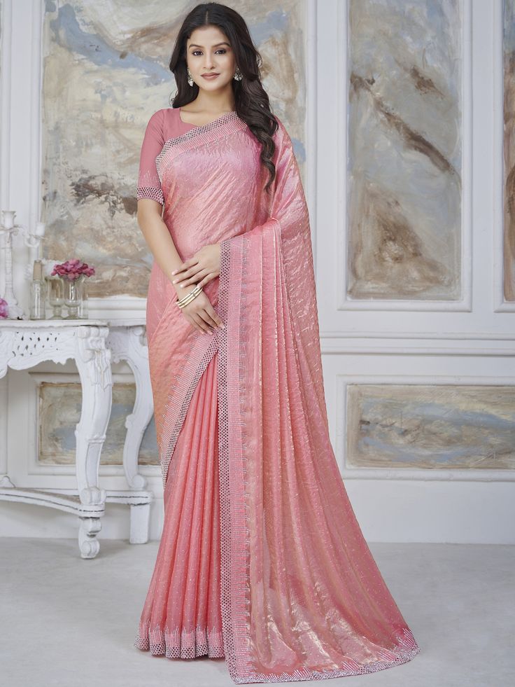 Dolly Organza Stone Cut Work Saree Premium quality fabric Enhanced with stone embroidery work. Comes with unstitch blouse fabric High quality fabric and stitching. Introducing the Dolly Saree, crafted from delicate Organza fabric and adorned with intricate stone cut work. The perfect blend of elegance and artistry, this saree is sure to make a statement. Peach Chanderi Saree With Resham Embroidery, Pink Art Silk Saree With Mirror Work, Eid Pink Blouse Piece With Mirror Work, Peach Traditional Wear With Mirror Work, Pink Georgette Saree With Dabka Work, Peach Saree With Dori Work, Pink Blouse Piece With Dabka Work For Diwali, Pink Dabka Work Blouse Piece For Diwali, Designer Peach Georgette Traditional Wear