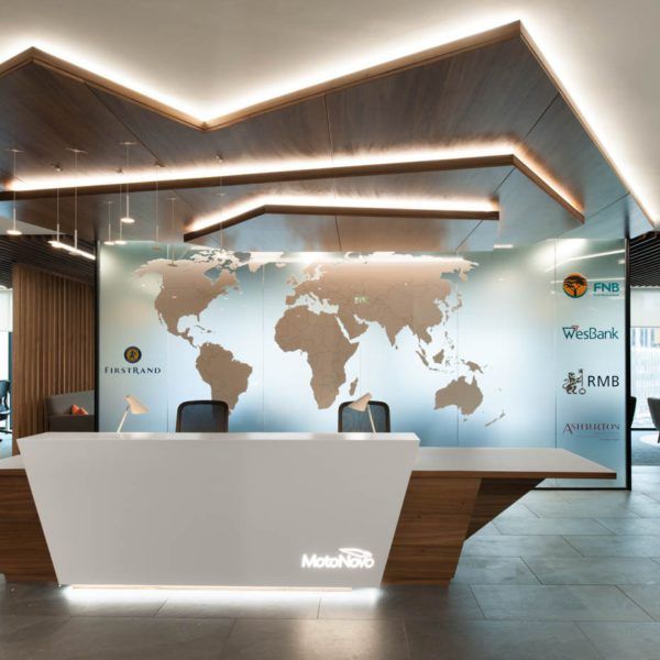 an office with a world map on the wall