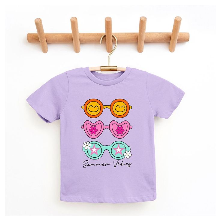 Looking for a cute tee for your kids? We have the perfect Sunnies Summer Vibes graphic tee addition to their closet! Also available in toddler tees. Purple Graphic Tee With Character Print, Casual Purple T-shirt With Cartoon Print, Purple Graphic Tee With Funny Print, Purple Graphic Tee With Cartoon Print, Purple Cartoon Print Graphic Tee, Spring Purple T-shirt With Graphic Print, Purple Cartoon Print Fun T-shirt, Fun Purple T-shirt With Funny Print, Casual Spring T-shirt With Cute Design