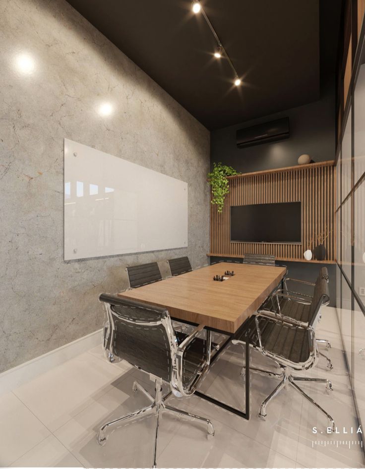 an empty conference room with chairs and a large wooden table in front of a white board