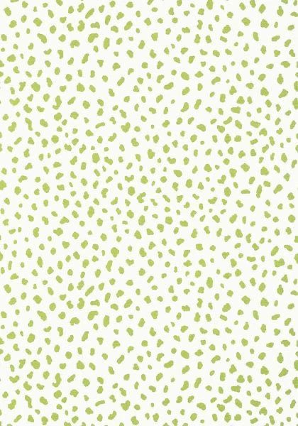 a white background with green spots on it