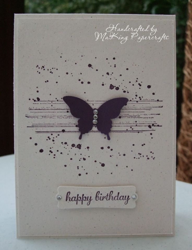 a white card with a black butterfly on it's side and the words happy birthday