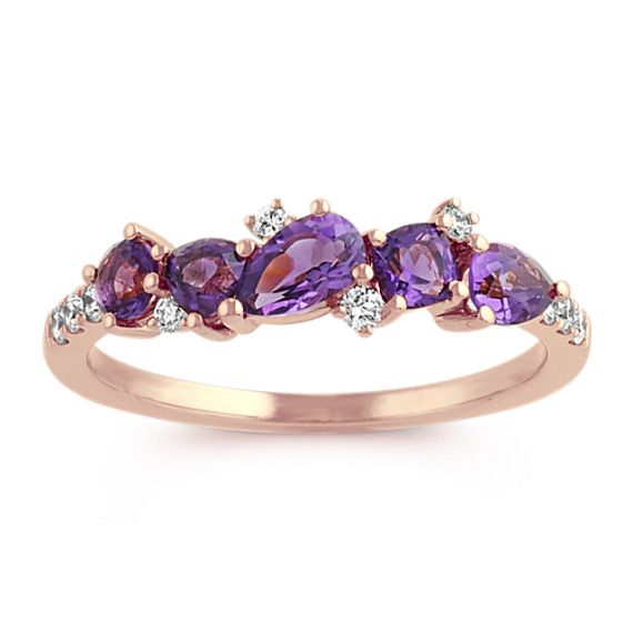 Crafted in quality 14 karat rose gold  two pear-shaped amethyst gemstones (approx. .33 ct. TW)  one cushion cut amethyst gemstone (approx. .14 carat)  one round amethyst gemstone (approx. .10 carat)  one trillion cut amethyst gemstone (approx. .10 carat) and ten round diamonds (approx. .12 carat TW) all come together in this lovely fashion ring. The ring measures 1.3mm wide at the band and has a total gem weight of approximately .79 carat. Gemstone Diamond Ring, Lovely Fashion, Custom Jewellery, Amethyst And Diamond Ring, Pretty Rocks, Platinum Jewelry, Natural Diamond Ring, Dope Jewelry, Amethyst Jewelry