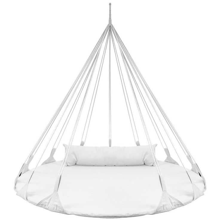 a white hanging chair with pillows on it's back and the seat is made out of