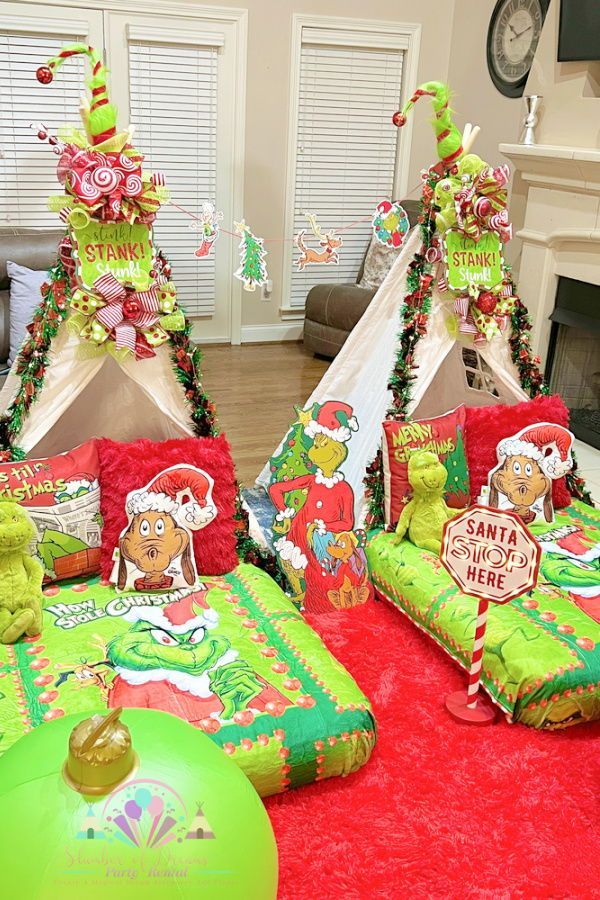 christmas themed beds in the living room decorated with holiday decorations and gifts for children to decorate