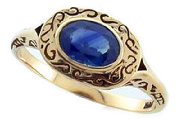 9CT/9K SOLID GOLD NATURAL SAPPHIRE SCROLL RINGThis lovely Vintage inspired ring has been crafted in 9ct Solid Yellow GoldAn Earth Mined NATURAL SAPPHIRE has been masterfully inset into a bezel as the centrepiece and has been beautifully decorated on the face with scroll patterns. A pierced gallery is another highlight of this ring and runs subtly along the shoulders creating an elegant looking vintage inspired piece ready to be cherished and enjoyed by the lady who appreciates wearing fine jewel Formal 14k Gold Sapphire Ring With Oval Cabochon, Gold Cabochon Sapphire Ring In 14k Gold, Victorian 14k Gold Oval Emerald Ring, Victorian Oval Emerald Ring In Yellow Gold, Victorian Oval Yellow Gold Emerald Ring, Yellow Gold Sapphire Cabochon Ring, Victorian Yellow Gold Sapphire Ring Stamped 14k, Victorian 14k Gold Sapphire Ring, Victorian Style 14k Gold Sapphire Ring