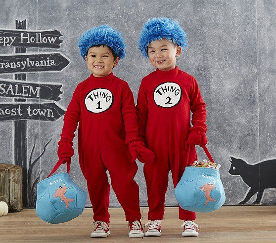 two children dressed in dr seuss and thing 1 costumes